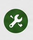 Symbol eines Werkzeugs mit einem Schraubenschlüssel und Hammer auf grünem Hintergrund.