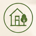 Grünes Symbol eines Hauses mit einem Baum daneben.